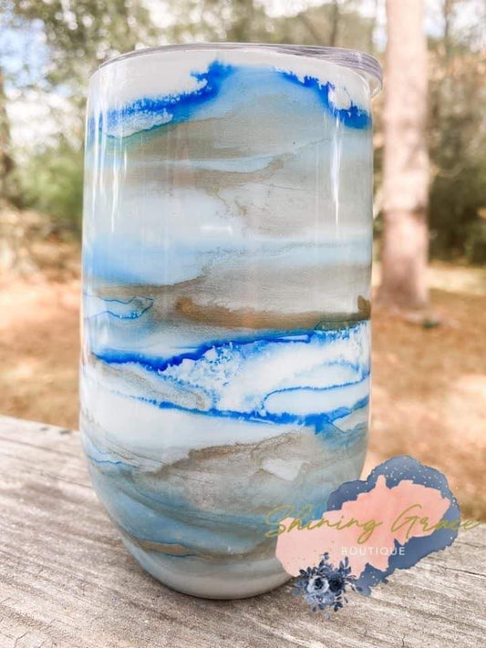 Alcohol ink swirl blue and gold